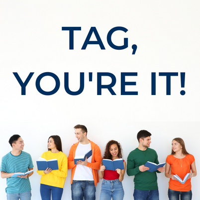 Six teens smiling at each other while holding books, below the words "TAG, you're it!"