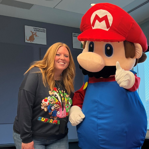 Ms. Brittany with Mario in Children's Program Room at Ankeny Library