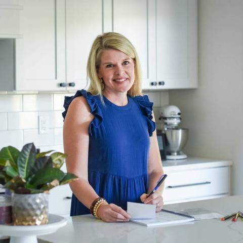 Photo of Erin Port in a white kitchen