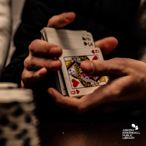 Photo of hands shuffling a deck of cards