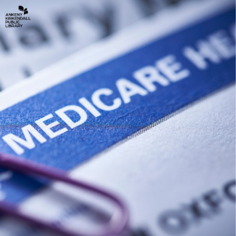 Close up photo of a Medicare card with a purple paperclip in the bottom left corner