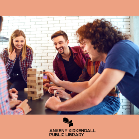 Group of people playing jenga