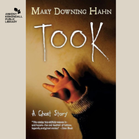 Cover of Took with a baby doll's hand on the cover