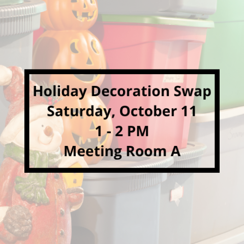 Photo of storage bins with Halloween and Christmas decorations near them