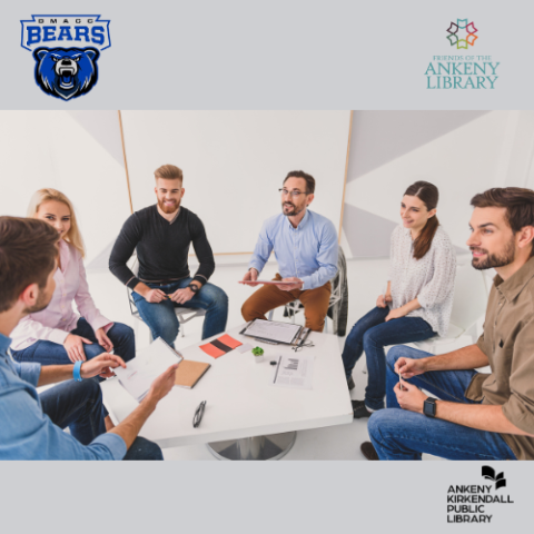 Group of people at a table talking 