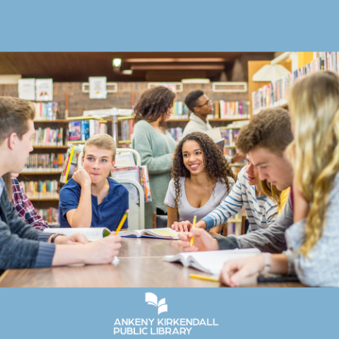 Group of teens talking with each other in a library
