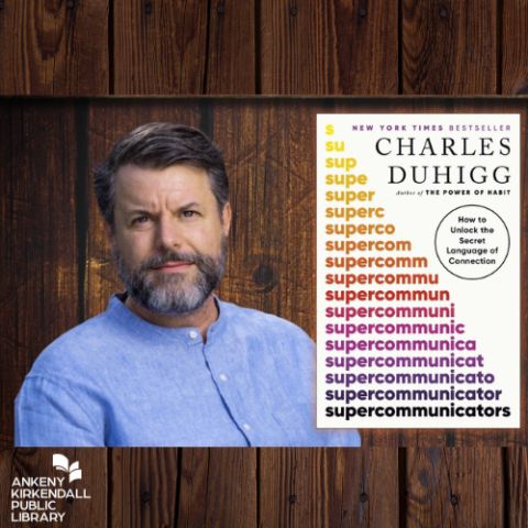 Photo of the author next to the book Supercommunicators with a wood panel background with the library logo in the bottom left corner 