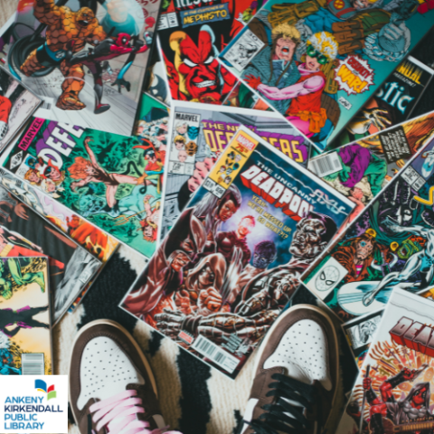 A splattering of comic books on the ground and someone's shoes next to them