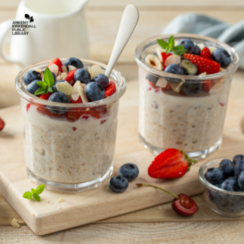 Overnight oats in glass jars with strawberries, blueberries and almonds. Ankeny Public Library logo in top left corner