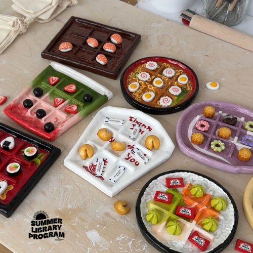 clay tic tac toe boards designed to look like take out