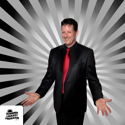 Ben Ulin behind a black background with grey lines and a glowing background