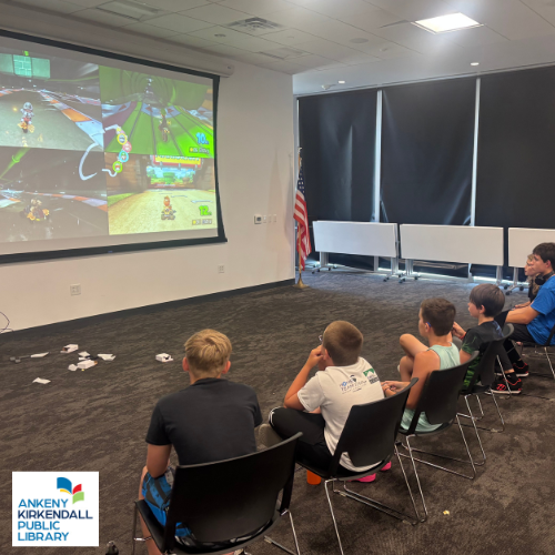 Teens playing Mario Kart on Nintendo Switch